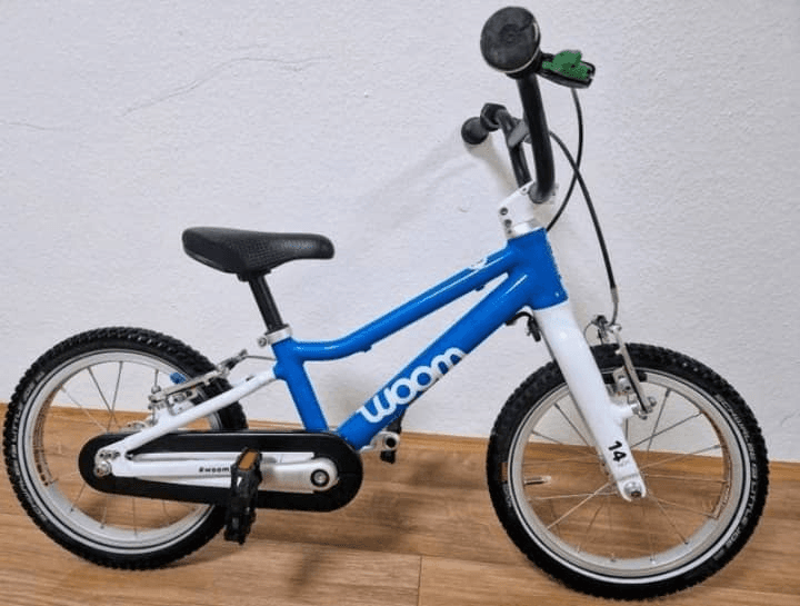 Vélo Woom 2 bleu en très bon état et fonctionne parfaitement - Photo 1