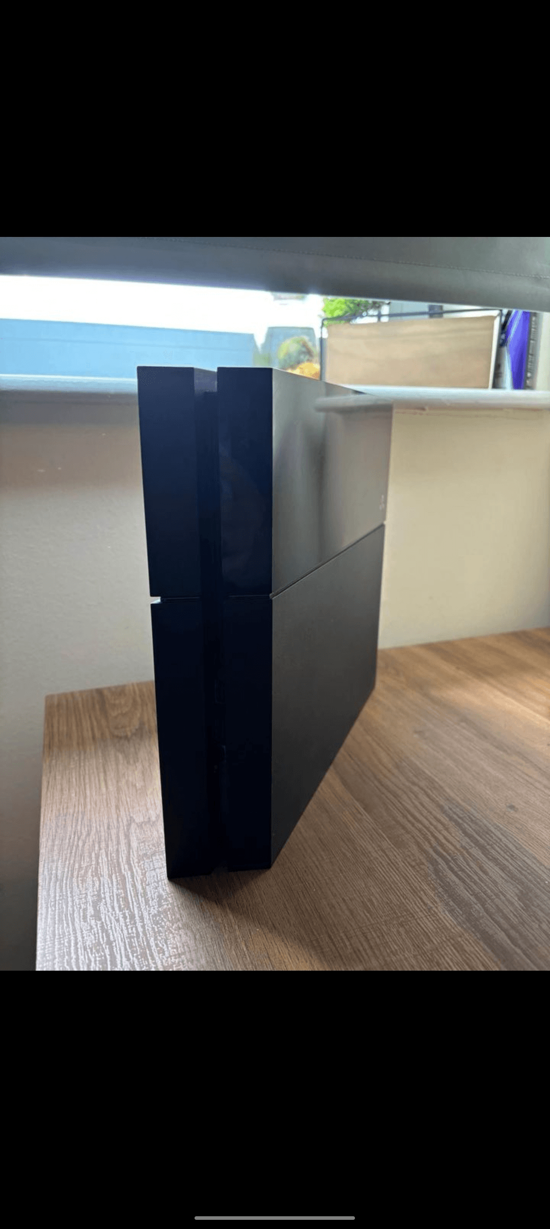 PS4 avec une manette et une garantie