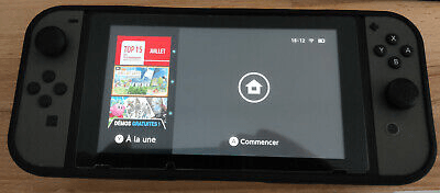 Nintendo Switch 32 Go + 128Go Console Grises avec accessoires - Photo 1