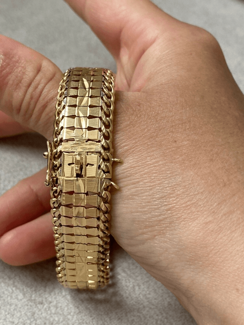 Bracelet en Or jaune 18 carats 750 millième poinçon tête d'aigle - Photo 1