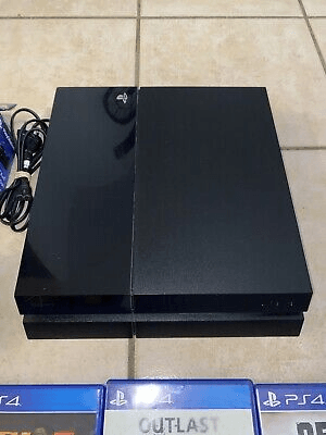 console ps4 fat 500 go plus 10 jeux +1 manette et station de recharge ps4 la console à une petite fi - Photo 1