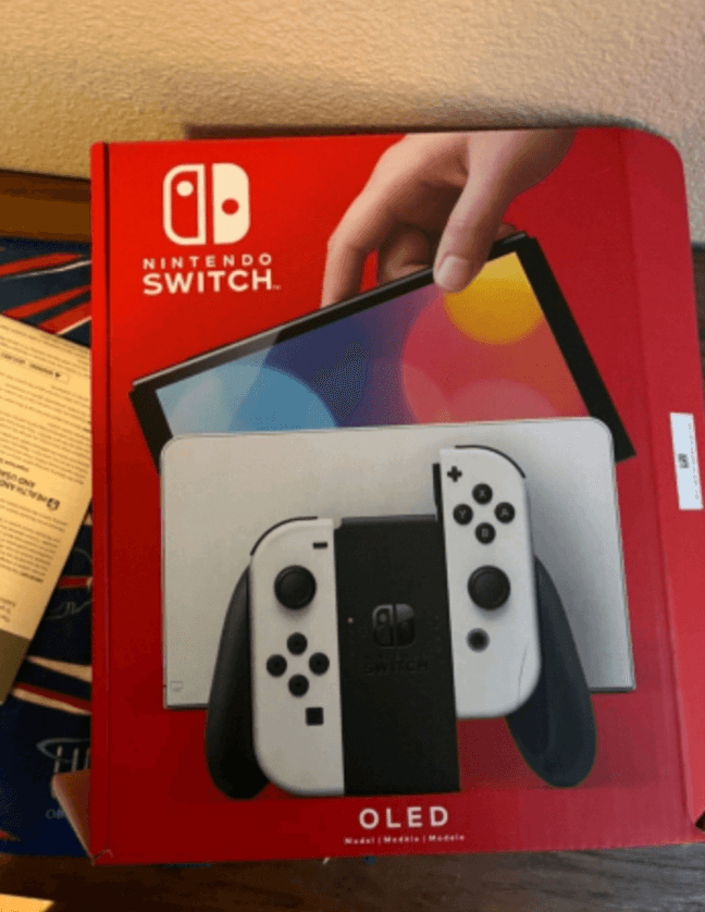 Nintendo Switch état tout neuf - Photo 1